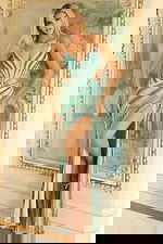 Fitted sequin gown with shimmering beadwork and thigh-high slit