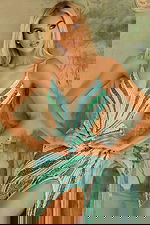 Close-up of geometric sequin pattern and plunging neckline