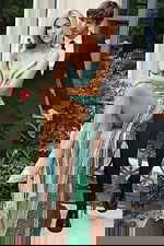 Beaded sheer gown with high slit