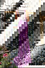 Sparkling sleeveless gown with sleek silhouette and metallic striped design