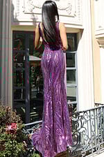 Sparkling sleeveless gown with sleek silhouette and metallic striped design