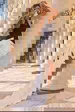 Sculpted formal dress with square neckline and dramatic back view