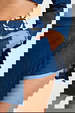 Chic denim co-ord with structured jacket and high-waisted mini skirt