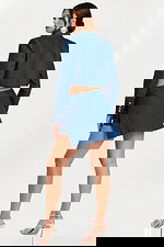 Fashion-forward denim suit set with jewel buttons and modern silhouette