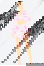 Front view of tweed crop jacket and mini skirt with pink floral embroidery