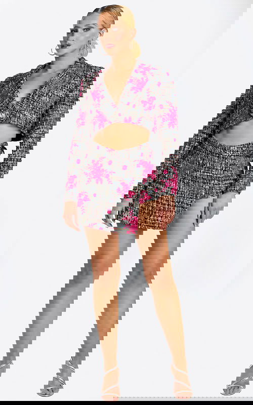 Front view of tweed crop jacket and mini skirt with pink floral embroidery