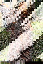 Sheer embroidered gown with long bell sleeves and soft metallic design