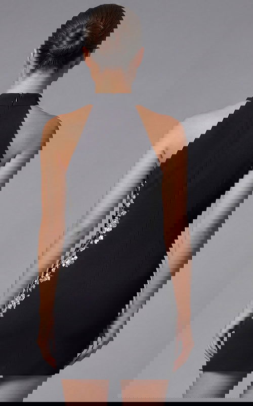 Back view of halter mini dress with clean lines and tailored fit