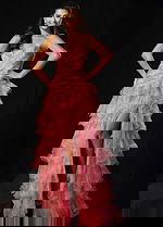 Strapless tiered gown with cascading ruffles and slit front