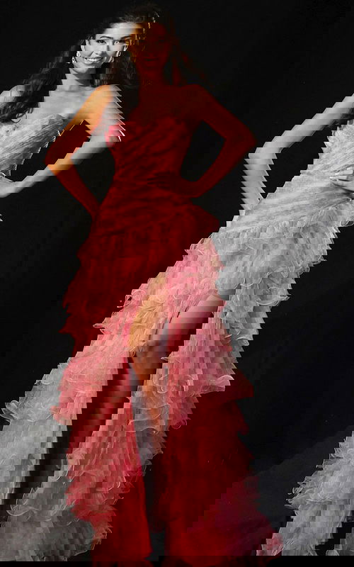 Strapless tiered gown with cascading ruffles and slit front