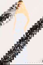 Strapless fitted gown embellished with shimmering floral sequins in navy, silver, and black tones.