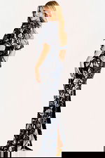 Strapless fitted gown embellished with shimmering floral sequins in navy and silver tones.