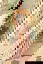 Strapless satin gown with beaded neckline and high slit in a flowing A-line silhouette