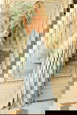 Elegant strapless satin dress featuring a structured bodice and floor-length skirt with front slit