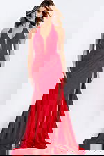 Red halter prom dress with deep neckline and high slit