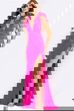 Fitted gown with ruffled shoulders deep V neckline and high slit