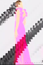 Open back evening gown with ruched waist and flowing skirt