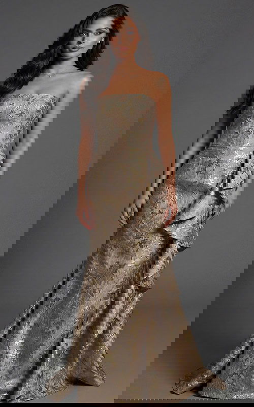 Strapless brocade gown with fitted silhouette and side drape