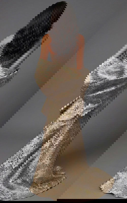 Back view of strapless formal gown with structured fit and flowing hem