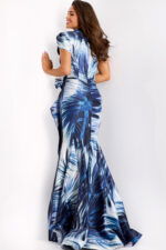 Fitted blue tropical print gown with puff sleeves and side bow