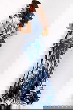 Fitted blue tropical print gown with puff sleeves and side bow