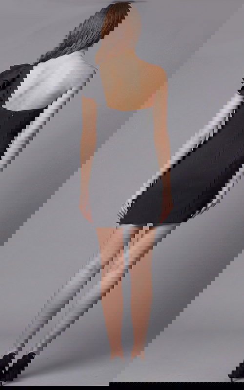 Back view of a fitted one shoulder mini dress with clean straight back