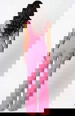 Back view of fitted jumpsuit with clean lines and wide leg silhouette