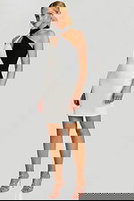 Model Wearing Halter Bodycon Dress With Asymmetric Black And White Design