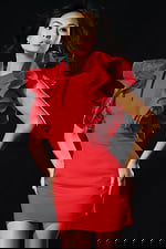 Sleeveless red mini dress with dramatic layered ruffles on shoulders