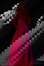 Stylish pink halter jumpsuit with deep neckline and side pockets