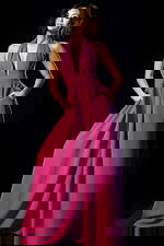 Halter wide-leg jumpsuit with plunging neckline and pleated waist