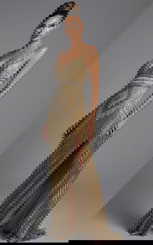 Front view of off shoulder gown with layered ruffled neckline and fitted silhouette