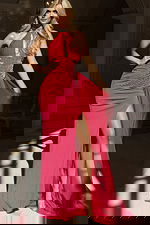 Halter gown with jeweled neckline, ruched waist, and flowing chiffon overlay