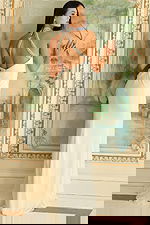 Halter neck gown with crystal-embellished bodice and high slit design