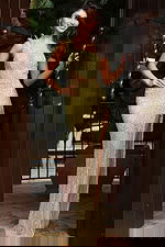 One shoulder embellished gown with sheer illusion panels and high slit