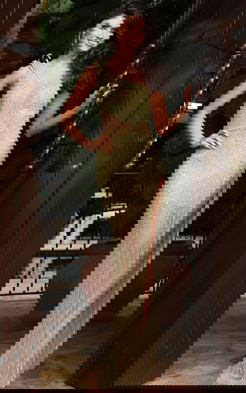 One shoulder embellished gown with sheer illusion panels and high slit