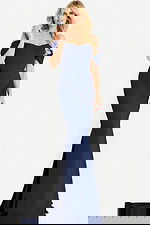 Off the shoulder fitted gown featuring a sweetheart neckline, ruched waist detail, and elegant floor length mermaid skirt with a small train.