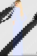 Long sleeve formal gown with asymmetrical draped shoulder accent