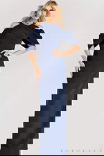 Navy cold shoulder gown with draped cape sleeves and a beaded neckline, tailored in a sleek column silhouette for a refined formal look.