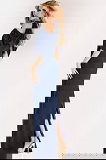 Cold shoulder gown with draped chiffon sleeves, high slit, and jeweled halter neckline for an elegant formal look.