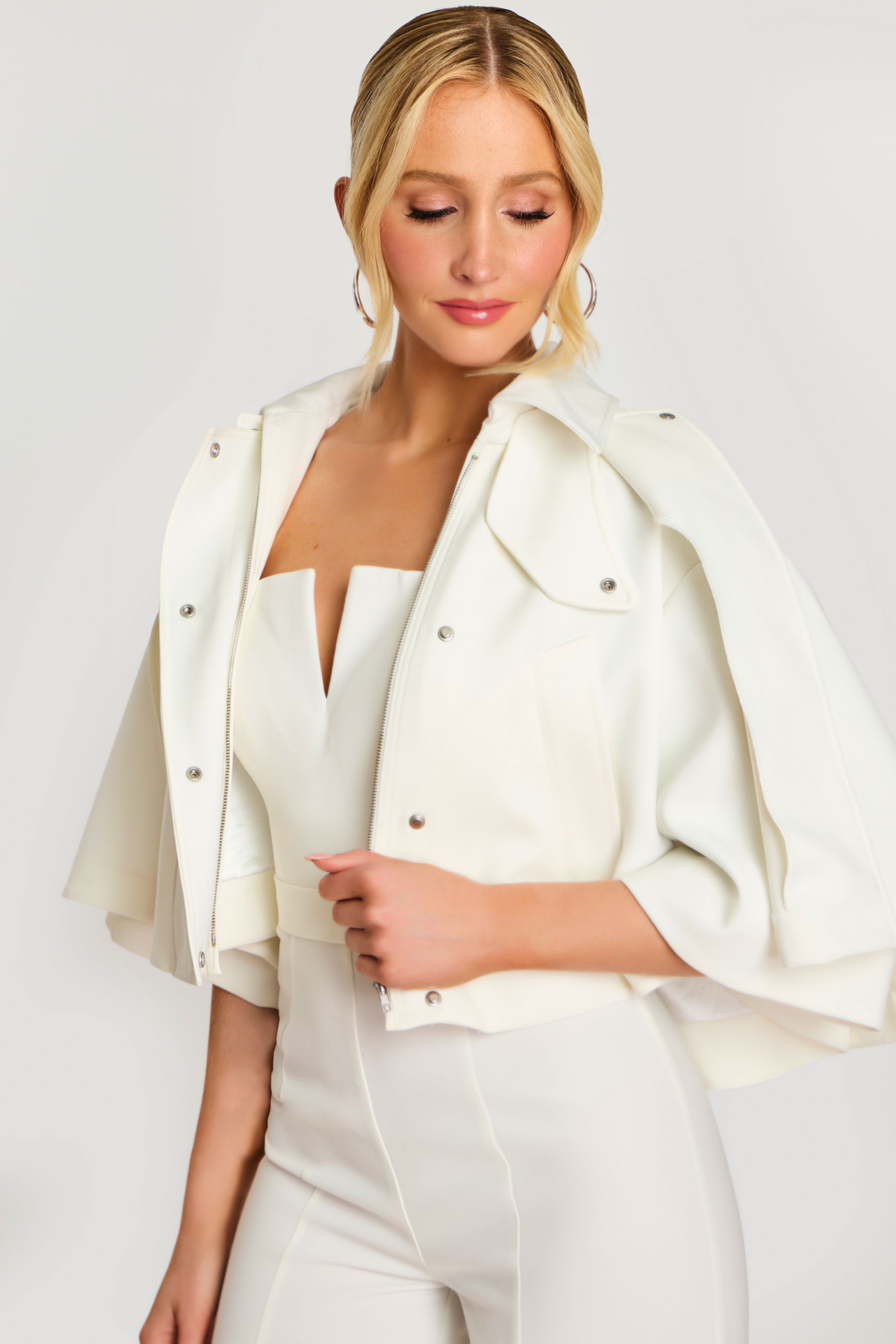 White Jumpsuit with V-Notch Neckline and Cape 46781 | Jovani