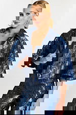 model wearing two piece jumpsuit with matching cape 46782