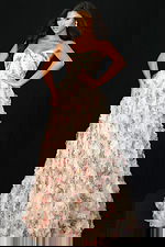 Front view of strapless beaded gown with corset bodice and tulle skirt