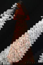 Back view of strapless gown with shimmering beadwork and sheer corset design