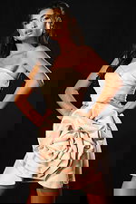 trapless mini dress with large rosette detail on the skirt and fitted bodice