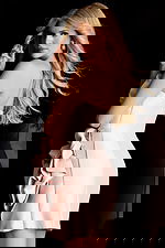 Strapless satin mini dress with oversized floral appliqué detail