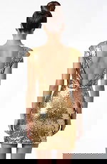 Back view of sequin dress with open V back and smooth fitted silhouette