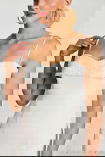 close up of fitted embellished dress