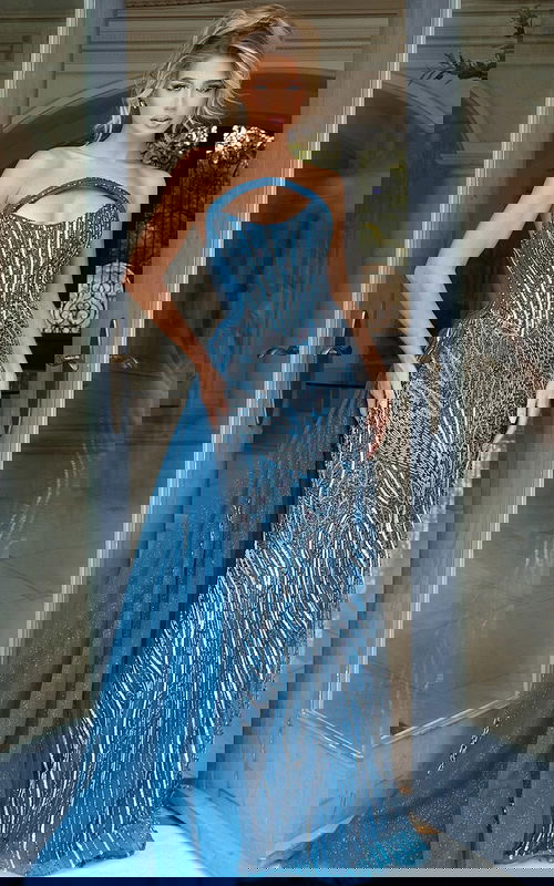 Fitted beaded gown with structured bodice and glittering embellishments