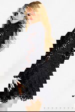 Elegant embroidered short dress featuring intricate cutout patterns